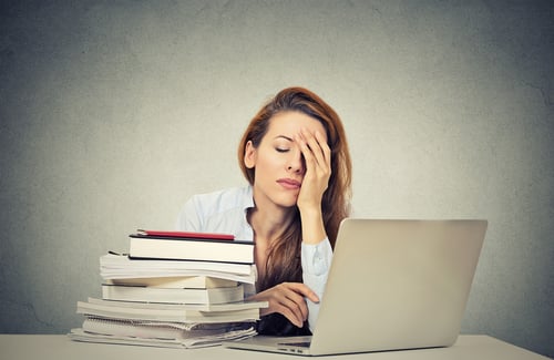 Frustrated woman using a computer